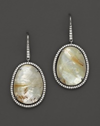 Diamonds circle a faceted doublet of rutilated quartz over mother of pearl, set in blackened sterling silver. By Di Massima. Diamonds circle a faceted doublet of rutilated quartz over mother of pearl, set in blackened sterling silver. By Di Massima.