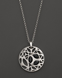 A bold sterling silver pendant glistening with faceted black onyx. By Di MODOLO. A bold sterling silver pendant glistening with faceted black onyx. By Di MODOLO.