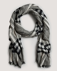 Soft, shadowy shades in a classic Burberry check keep you warm and stylish. Soft, shadowy shades in a classic Burberry check keep you warm and stylish.