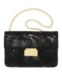 Sleek and chic, the Sloan clutch purse by MICHAEL Michael Kors also flaunts an optional chain strap. Sleek and chic, the Sloan clutch purse by MICHAEL Michael Kors also flaunts an optional chain strap.