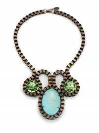 THE LOOKTribal Chic Collection Structured box chain designLarge turquoise and crystal detailsBronze-plated setting Lobster clasp THE MEASUREMENTLength, about 17Drop length, about 4½ORIGINMade in Lebanon THE LOOKTribal Chic Collection Structured box chain designLarge turquoise and crystal detailsBronze-plated setting Lobster clasp THE MEASUREMENTLength, about 17Drop length, about 4½ORIGINMade in Lebanon