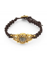 THE LOOKClassic collectionOrnate oval detailBlack Swarovski crystal and hematite accents18k goldplated and rhodium-plated settingBraided leatherToggle closureTHE MEASUREMENTAccent width, about 1Length, about 8.5ORIGINMade in USA THE LOOKClassic collectionOrnate oval detailBlack Swarovski crystal and hematite accents18k goldplated and rhodium-plated settingBraided leatherToggle closureTHE MEASUREMENTAccent width, about 1Length, about 8.5ORIGINMade in USA